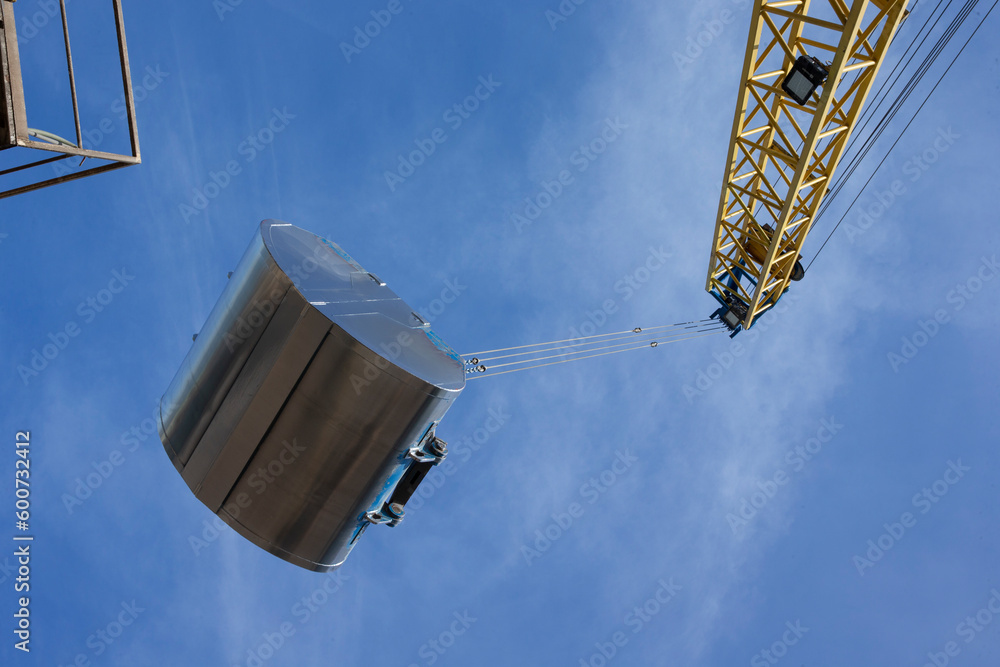 Unloading a ship of soja beans by crane. Barge. Inland vessel. River ...