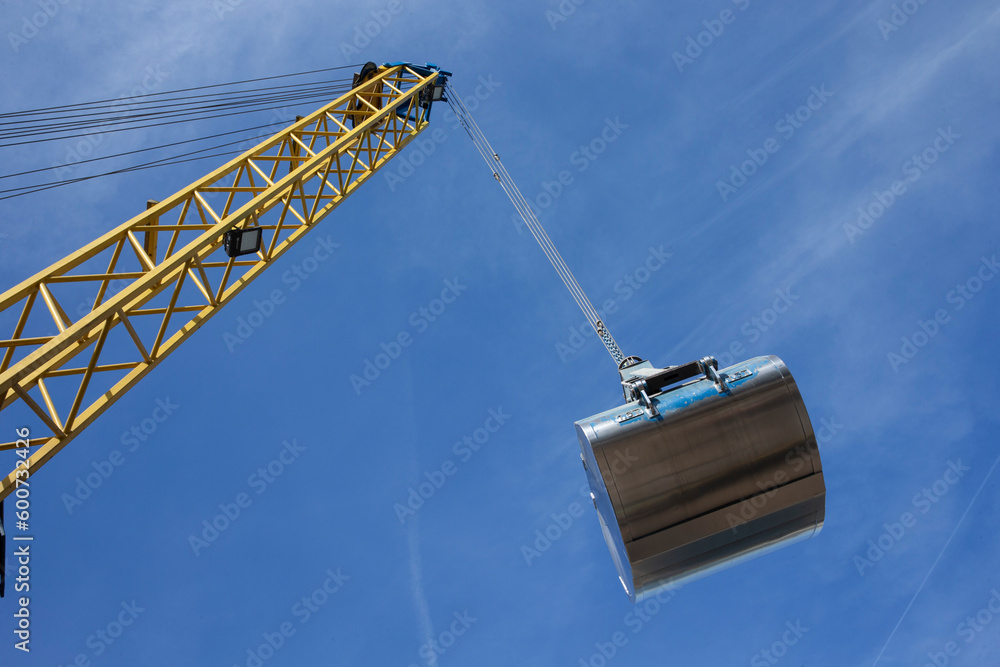Unloading a ship of soja beans by crane. Barge. Inland vessel. River ...