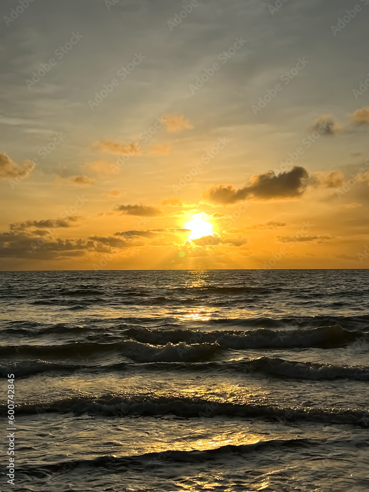 Evening sea with a beautiful golden sunset