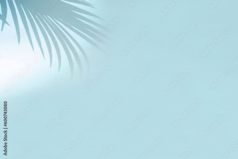 Minimal abstract background with blurry shadow of tropical palm leaves. Cosmetic product Presentation. Premium podium. Pastel light blue empty wall. Showcase, display case, Front view. Modern mockup