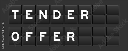 Black color analog flip board with word tender offer on gray background