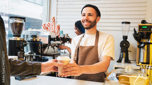 Barista working in coffee shop, making coffee, take away