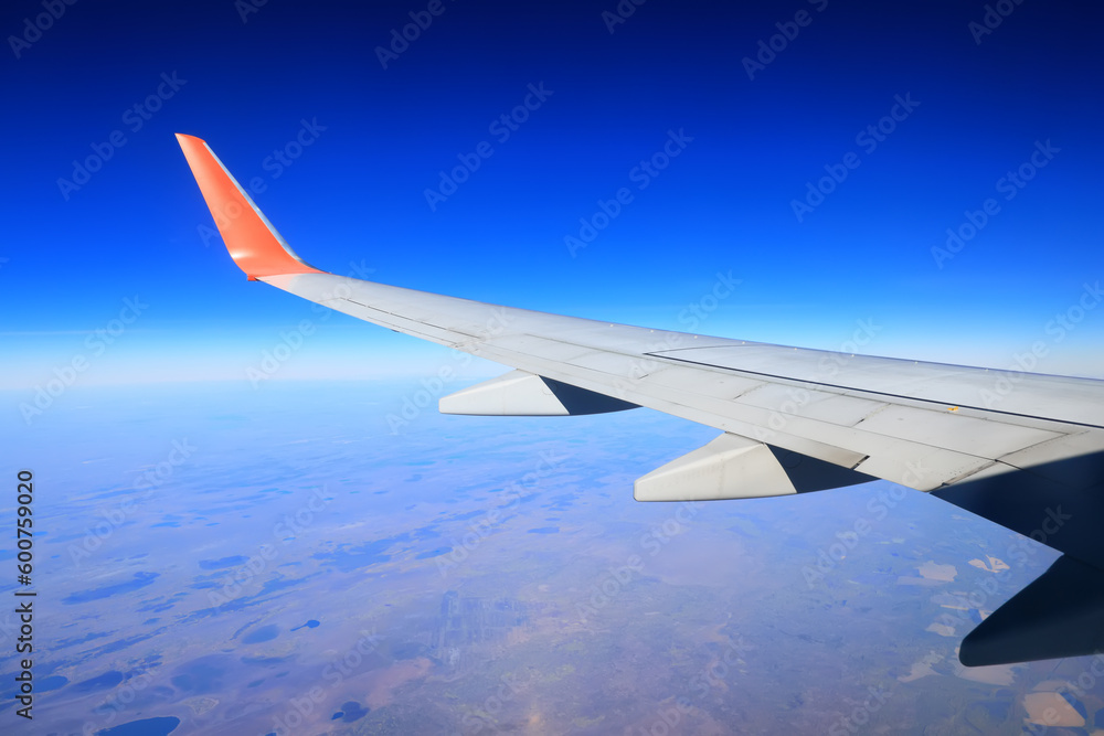 airplane wing sky view porthole airplane wing sky view porthole