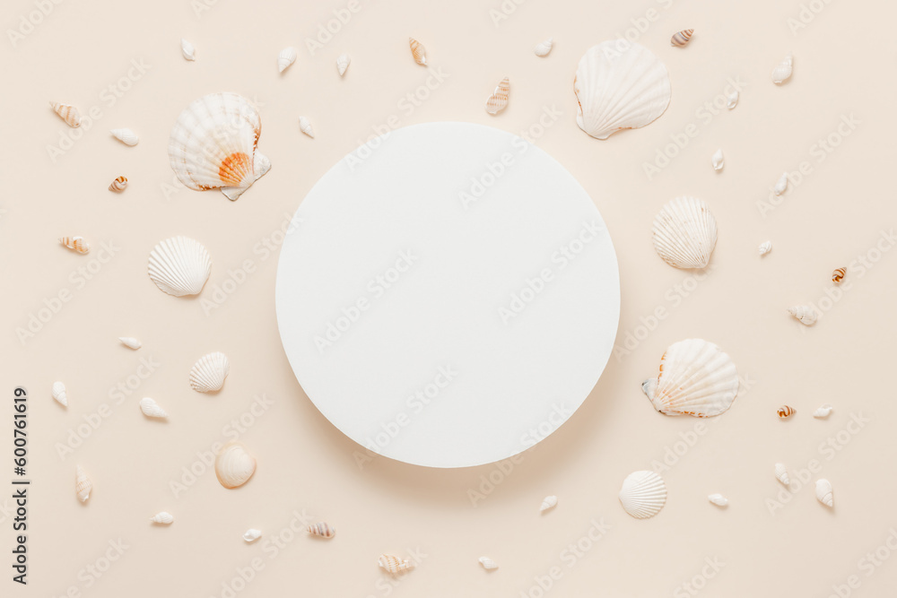 Empty product podium with seashells on beige background top view, flat lay. Display for product presentation, summer concept Empty product podium with seashells on beige background top view, flat lay. Display for product presentation, summer concept