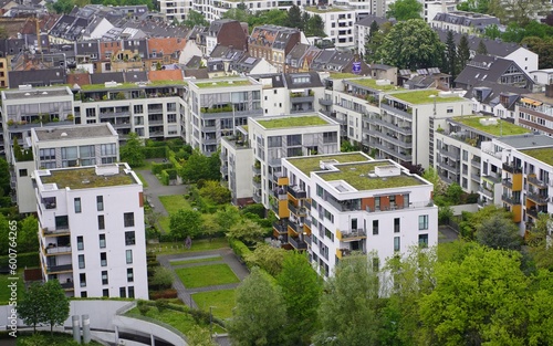 Green roofs with succulents and other plants on the roofs of residential buildings in Cologne, North Rhine-Westphalia, Germany.