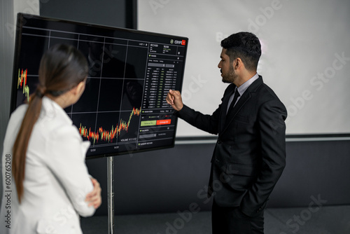 Wallpaper Mural Financial advisors collaborate to assess a company's financial performance using data from its operational activities. Team members work together in a discussions meeting to develop a business plan. Torontodigital.ca