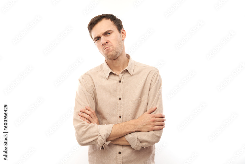 Portrait sad brunette young man isolated on white studio background. Made mistake, upset and depressed. Portrait sad brunette young man isolated on white studio background. Made mistake, upset and depressed.