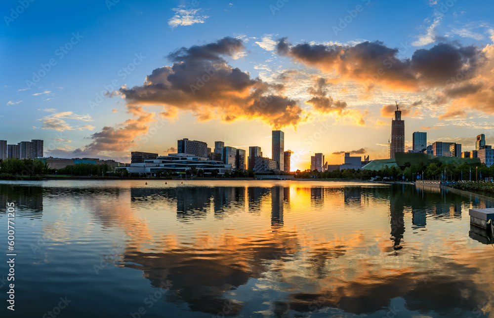 Panoramic view of city skyline and modern buildings at sunset in Ningbo, Zhejiang Province, China.