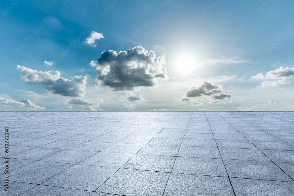 Empty square floor and sky clouds background