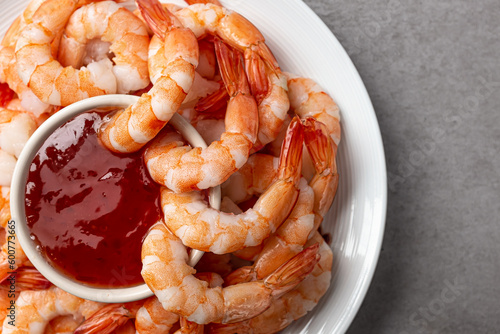 фотографія Food cocktail shrimp dipping shrimp in cocktail sauce