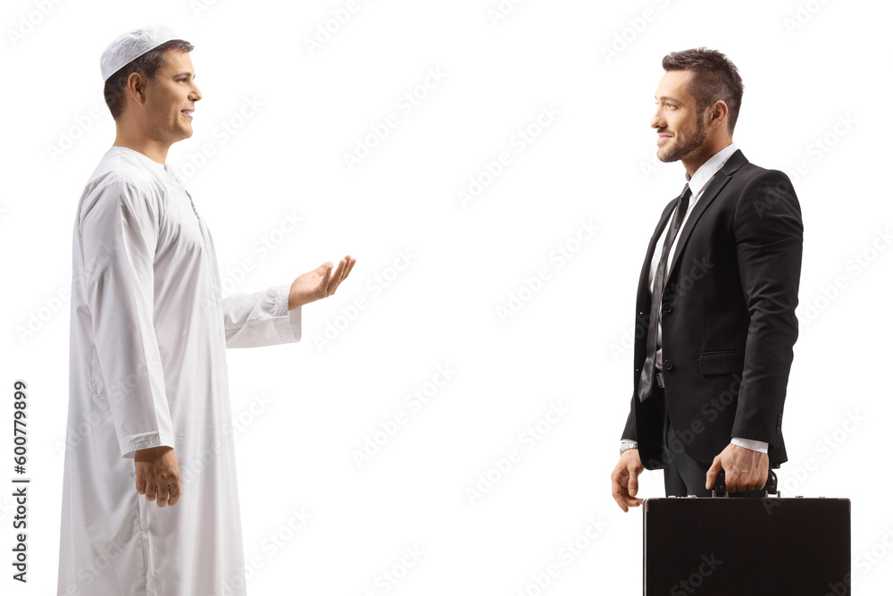 Profile shot of an arab man having a conversation with a businessman Profile shot of an arab man having a conversation with a businessman