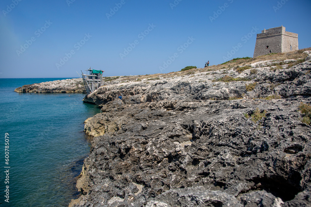 A lighthouse on the rocky coast of the Adriatic Sea