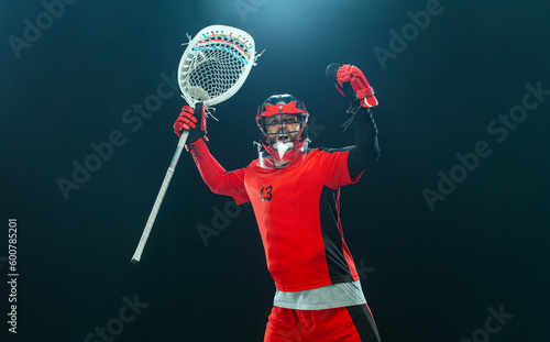 Lacrosse player match winner. Sports athlete goal keeper. Download photo for sports betting advertisement. Website header. Sports design in red neon glow. Sport and motivation wallpaper. © Mike Orlov