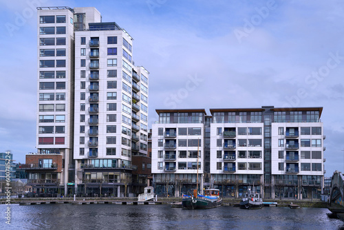 Row of modern apartment buildings in the Docklands area of Dublin along the Grand Canal © Spiroview Inc.