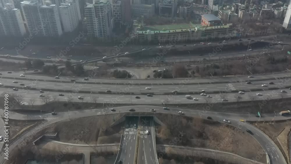 Cityscape around Seoul City Hall, shot above vehicles driving on the road and people walking South K Cityscape around Seoul City Hall, shot above vehicles driving on the road and people walking South K