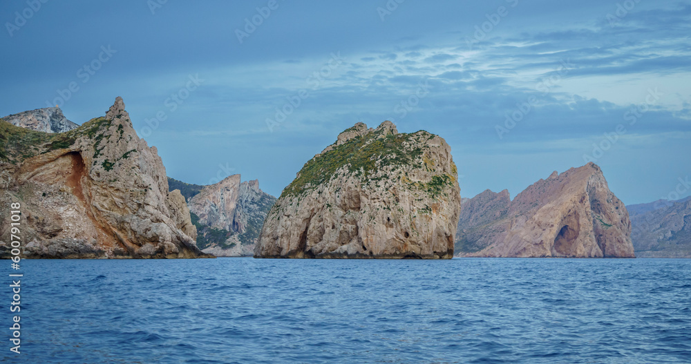 Es Colomer islet and Cala Boquer in the background, Tramuntana coast, Pollensa, Majorca, Balearic Islands, Spain