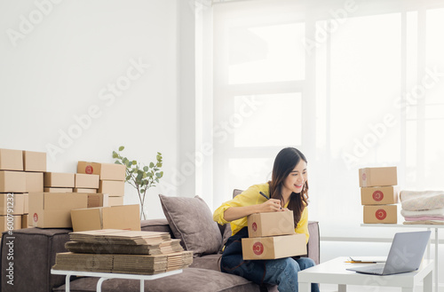 Small Entrepreneurs Start A Home Business By Arranging Goods With Brown Parcel Boxes, Small Home Business Startup Ideas..