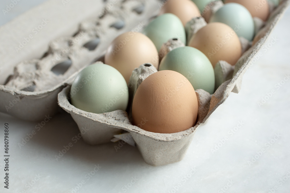 A view of a carton of farm fresh eggs. A view of a carton of farm fresh eggs.