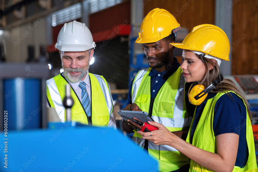 Plant manager visit engineer in factory at production line discuss on quality assurance improvement Plant manager visit engineer in factory at production line discuss on quality assurance improvement