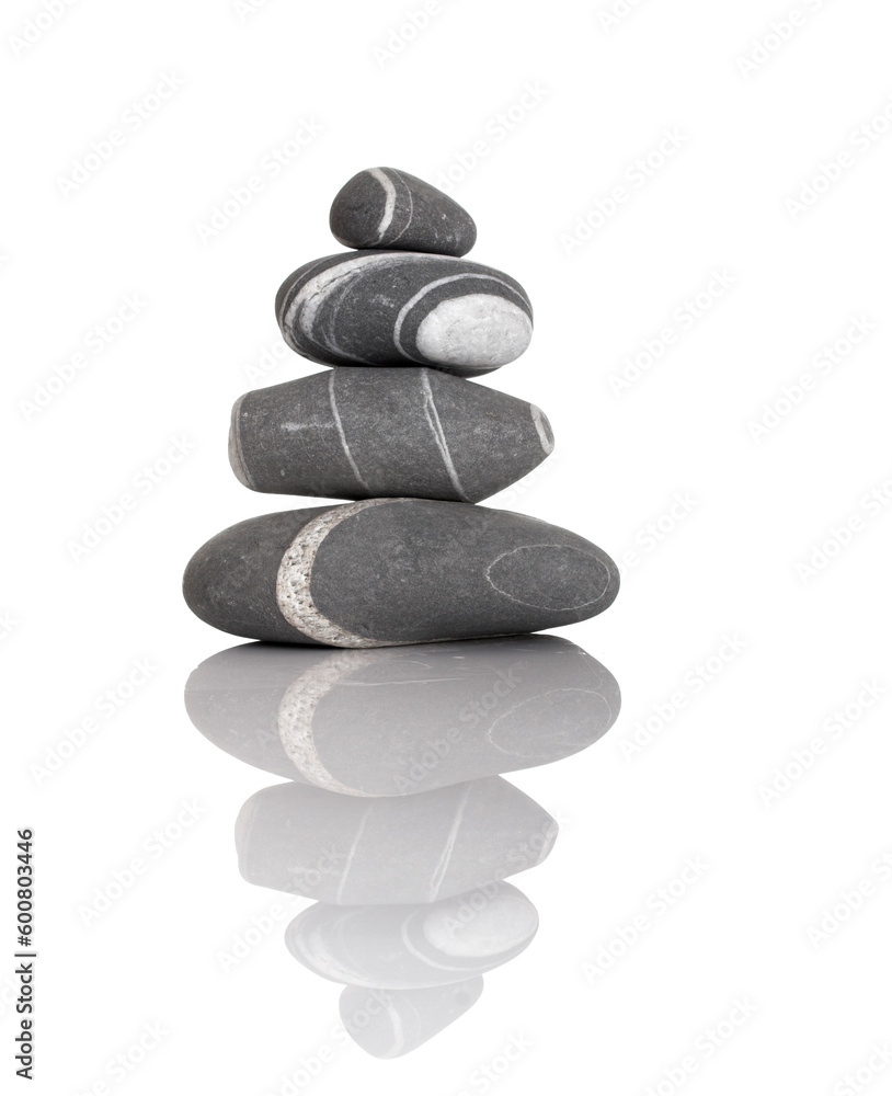 Stack of balanced stones on a white background Stack of balanced stones on a white background