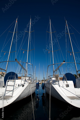 boats anchored in a harbour on a sunny day