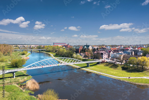 Cityscape of Wronki, Wielkopolska, Poland. Aerial summer view of the city on the bank of Warta river.