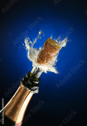 Champagne splash. Bottle and cork, celebration time © Designpics