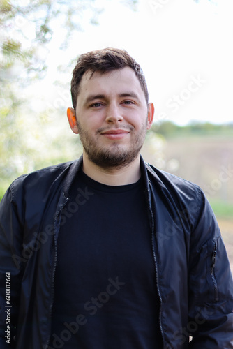 Handsome young man.Portrait of a male with a beard.Brutal man.Happy man.Cute boy.Emotion of happiness.Male smile.Portrait in nature.Spring photo.Dark-haired boy.Man in black.
Bokeh portrait.
Ukrainian