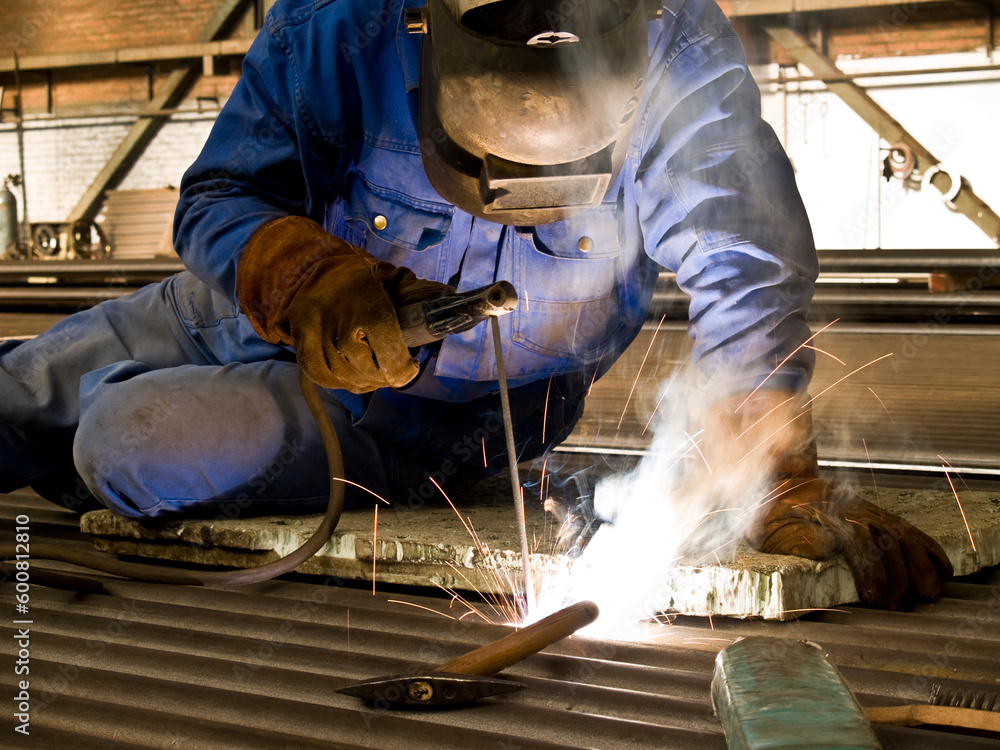 Welder in action. Welder in action.