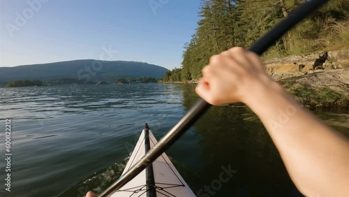 Kayaking in Indian Arm near Belcarra, Vancouver, BC, Canada. Sunny Sunset. Adventure Travel Concept photo