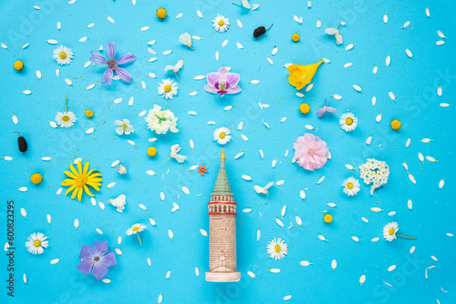 Galata Tower Model in the Daisy(Papatya) and Spring Flowers Concept Photo, Üsküdar Istanbul, Turkey (Turkiye) photo