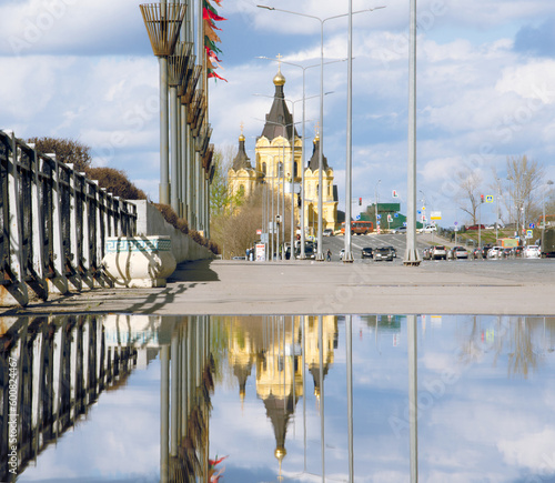 Nizhniy Novgorod, Russian Federation, April 27, 2023, Alexander Nevsky Cathedral with reflection in water
