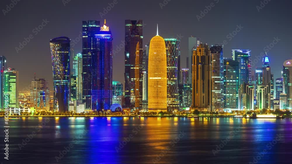DOHA, QATAR - JUNE 30th 2017: skycreapers tall buildings timelapse night downtown Middle East DOHA, QATAR - JUNE 30th 2017: skycreapers tall buildings timelapse night downtown Middle East