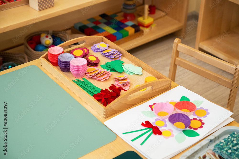 Fototapeta premium Classroom of Montessori kindergarten. The colorful Montessori material. Concept of children learning toy