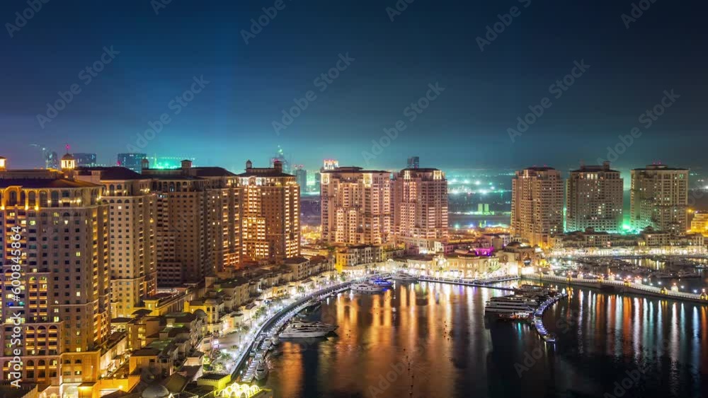 DOHA, QATAR - JUNE 30th 2017: skycreapers tall buildings timelapse night lights streets, Middle East DOHA, QATAR - JUNE 30th 2017: skycreapers tall buildings timelapse night lights streets, Middle East