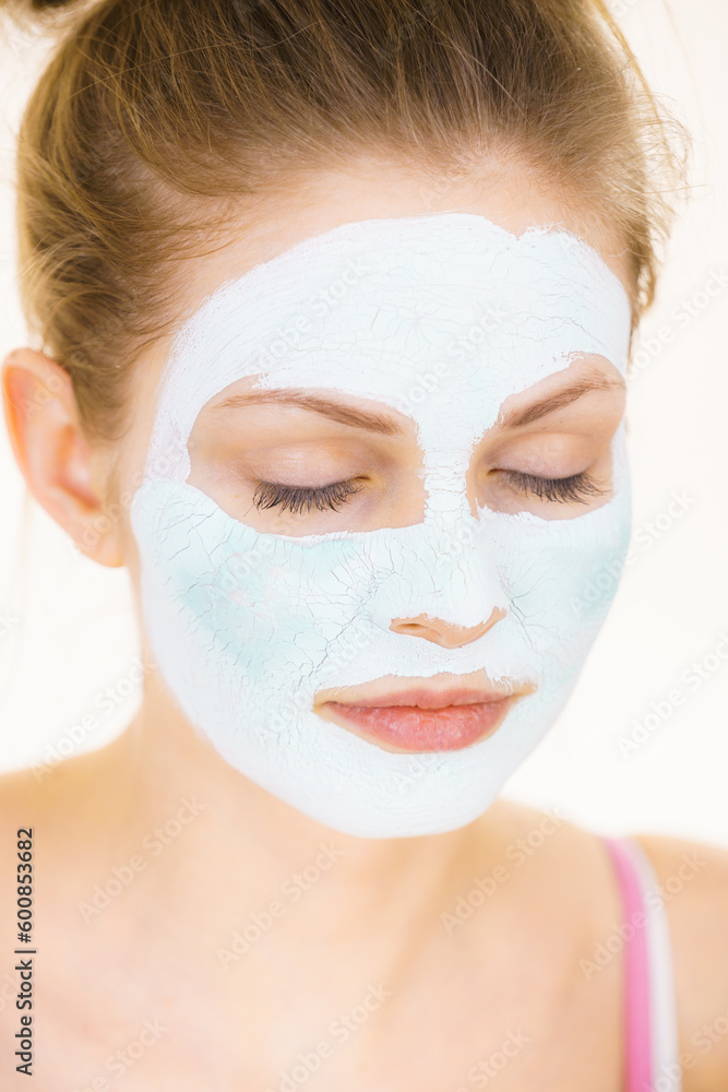 Girl with green mud mask on face Girl with green mud mask on face