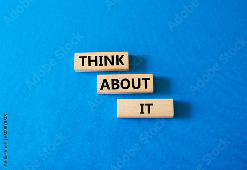 Think about it symbol. Wooden blocks with words Think about it. Beautiful blue background. Business and Think about it concept. Copy space.
