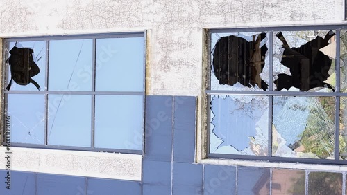 The war in the Donbas. Broken windows of the building. Bombing. photo