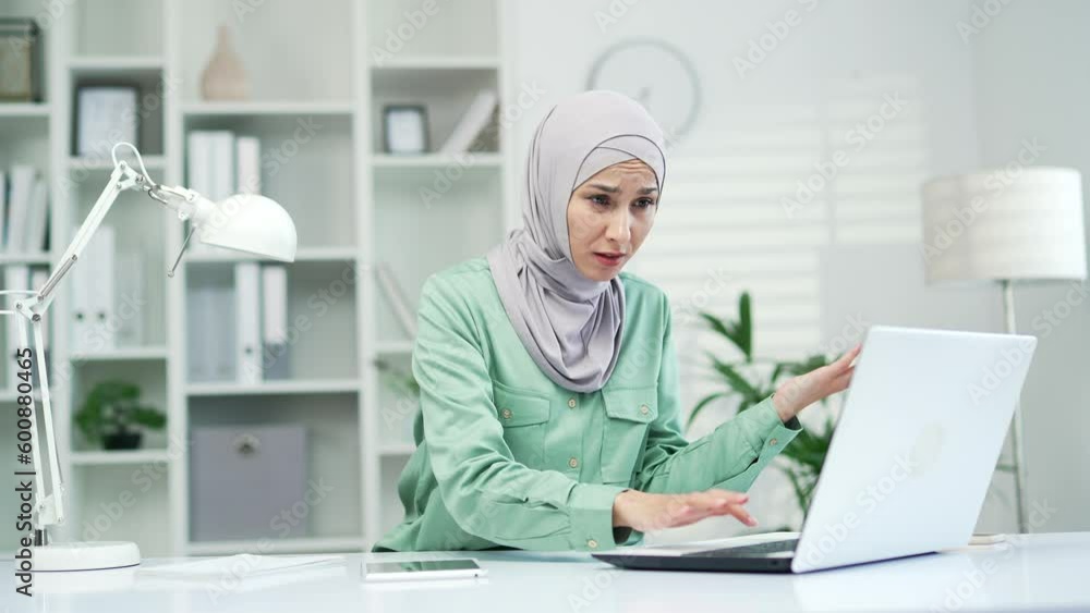 annoyed young woman looking at laptop screen, irritated by bad low internet connection frustrated working remotely at office home Stressed lady unhappy by hard task or system crash problem computer annoyed young woman looking at laptop screen, irritated by bad low internet connection frustrated working remotely at office home Stressed lady unhappy by hard task or system crash problem computer