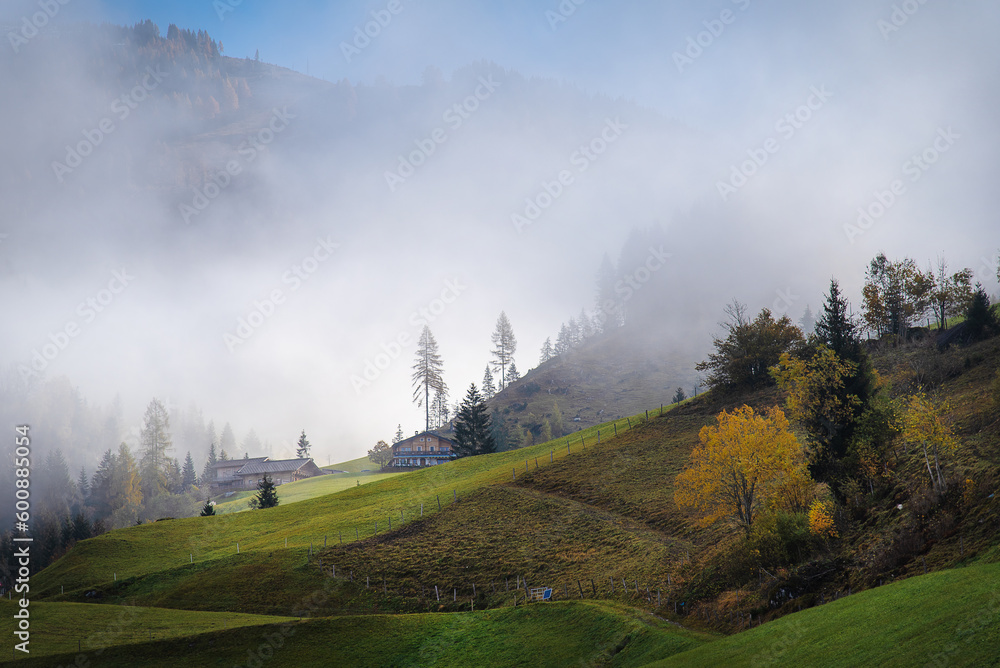 Picturesque misty morning in the Austrian Alps mountains Picturesque misty morning in the Austrian Alps mountains