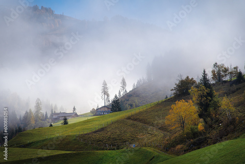 Picturesque misty morning in the Austrian Alps mountains