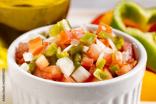 Quadro su tela Vinaigrette in ramekin on the table.