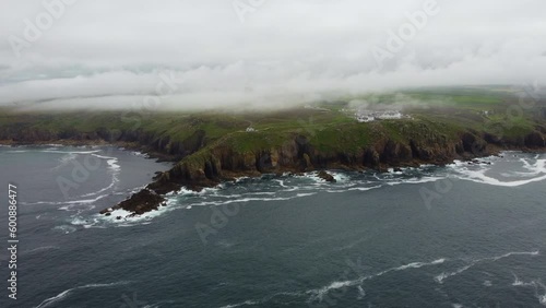 between landsend and sennen coastline with mist cornwall england uk from the air drone  photo