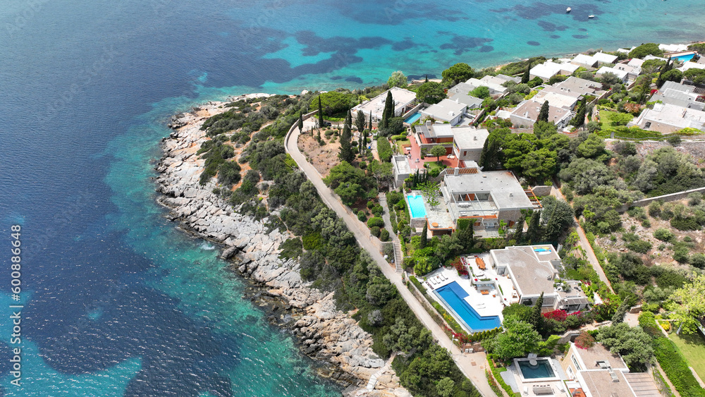 Aerial drone photo of seaside luxury pool resort in tropical exotic island bay