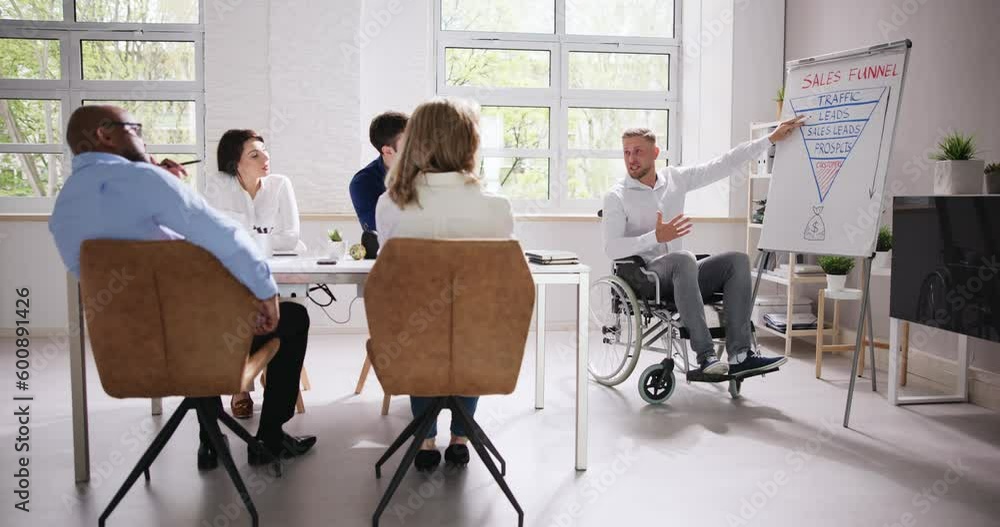 Wheelchair And Disability At Office. Giving Presentation Wheelchair And Disability At Office. Giving Presentation