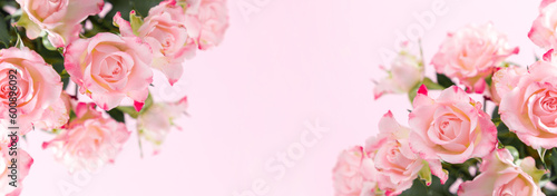 Bouquet beautiful flowers pink roses on pastel pink background table. Birthday, Wedding, Mother's Day, Valentine's day, Women's Day. Front view, banner