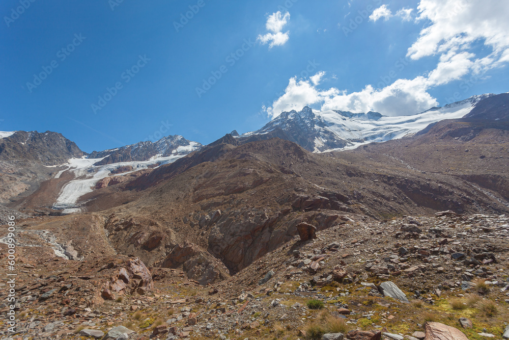 Obraz premium Scenic landascape with moraines of 1850 small ice age of Palla Bianca glaciers that indicate the enormous retreat of the glacier that occurred due to global warming, Alto Adige, Italy