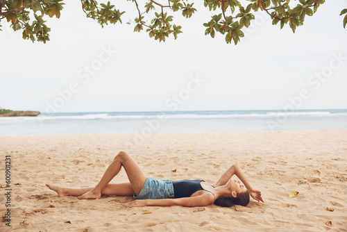 woman beach sitting freedom sea travel vacation smile nature holiday sand