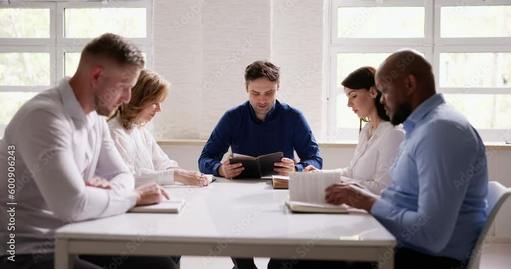 Group Of Young Multiethnic People Reading Bible Over Wooden Group Of Young Multiethnic People Reading Bible Over Wooden
