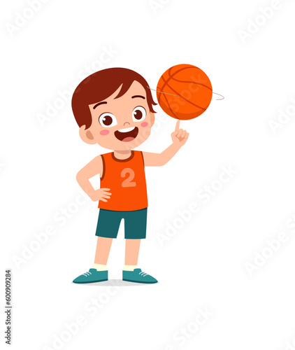 little kid play basketball and feel happy